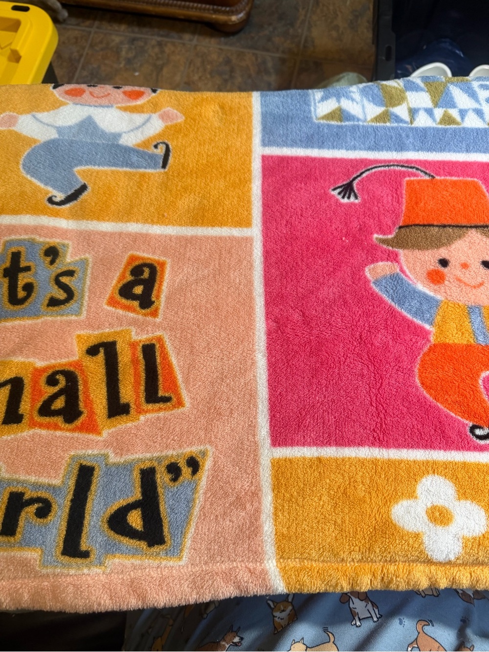 Disney Parks It’s a Small World Throw Blanket in Pink, Orange, Yellow, Blue